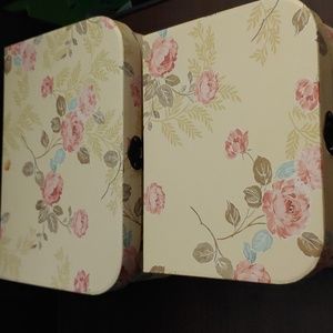Two floral boxes with metal closures and handle